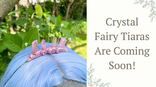 pink fairy tiara on a model with blue wig in a garden setting