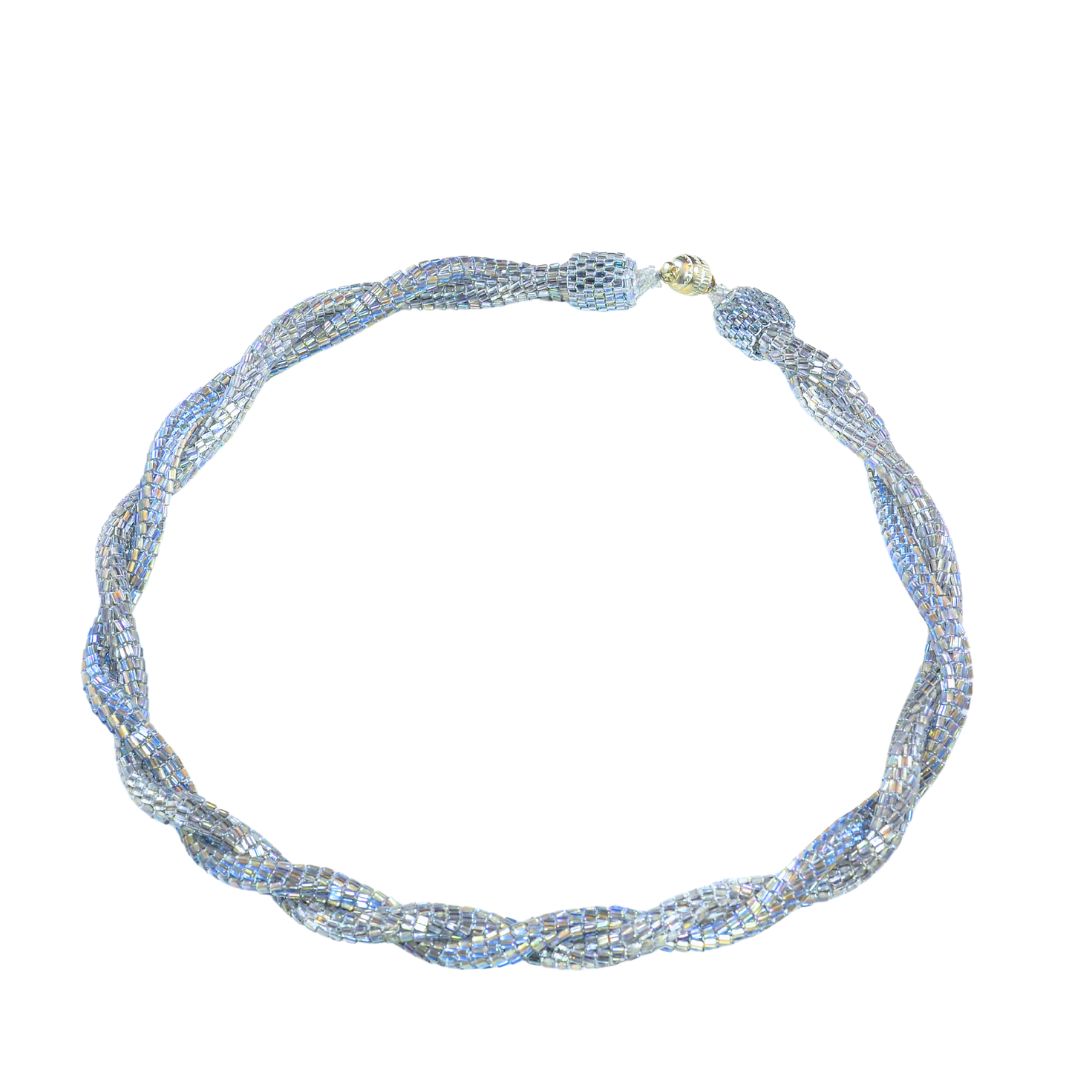 iridescent beaded rope necklace on a white background