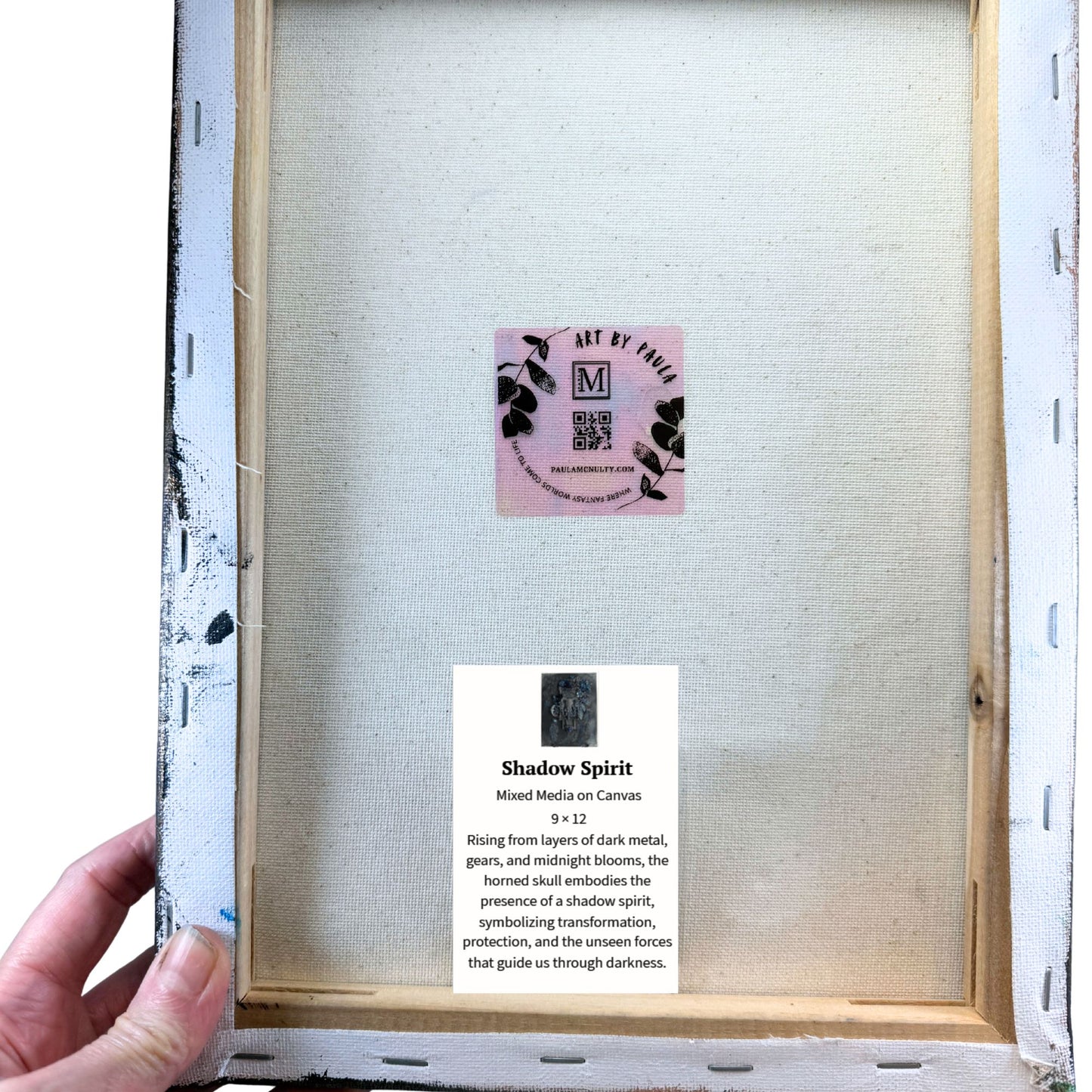 Framed artwork with a label and description on a white background