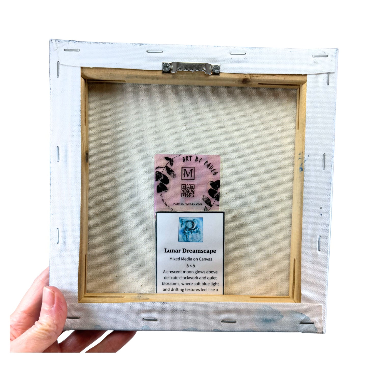Unframed artwork with a label inside the white frame