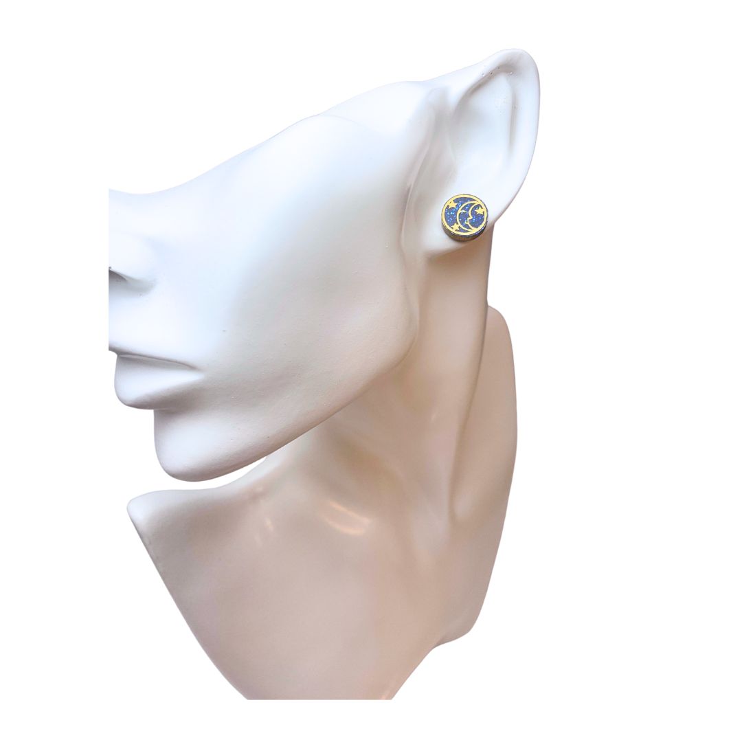 Bust wearing round acrylic glitter stud earrings