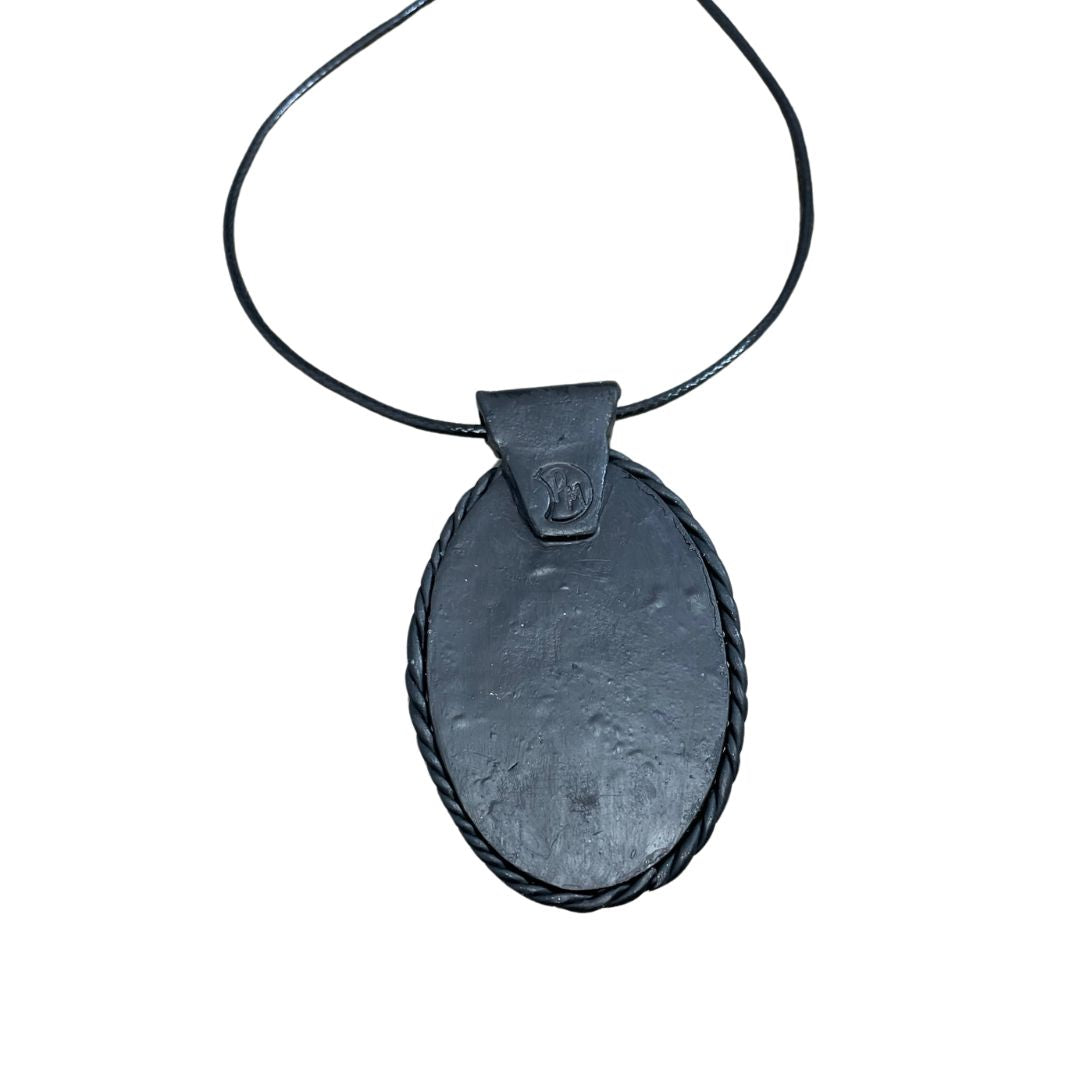 Back of oval clay, mushroom pendant