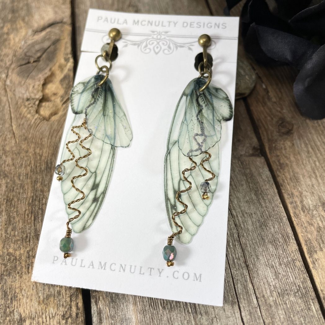 Green translucent butterfly wing earrings with wired crystals and clip on earrings
