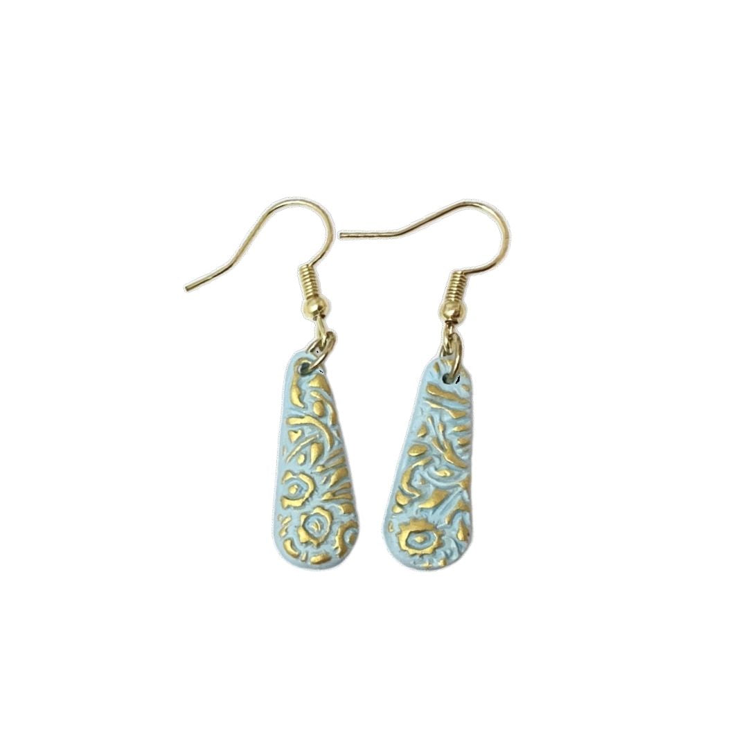 Duck egg blue teardrop earrings on white background