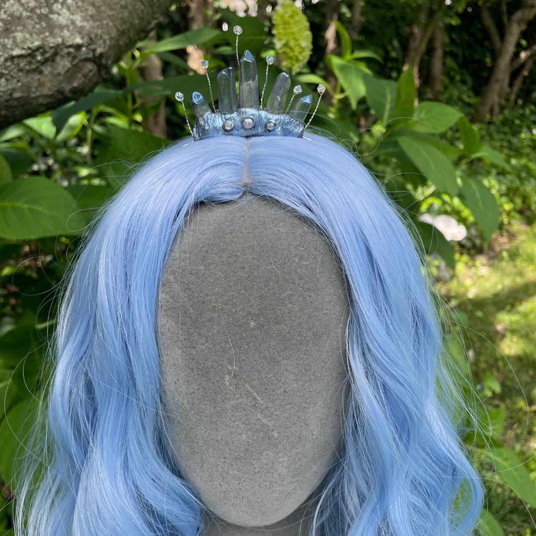 Fairy Princess blue tiara on a model with blue hair in a garden.