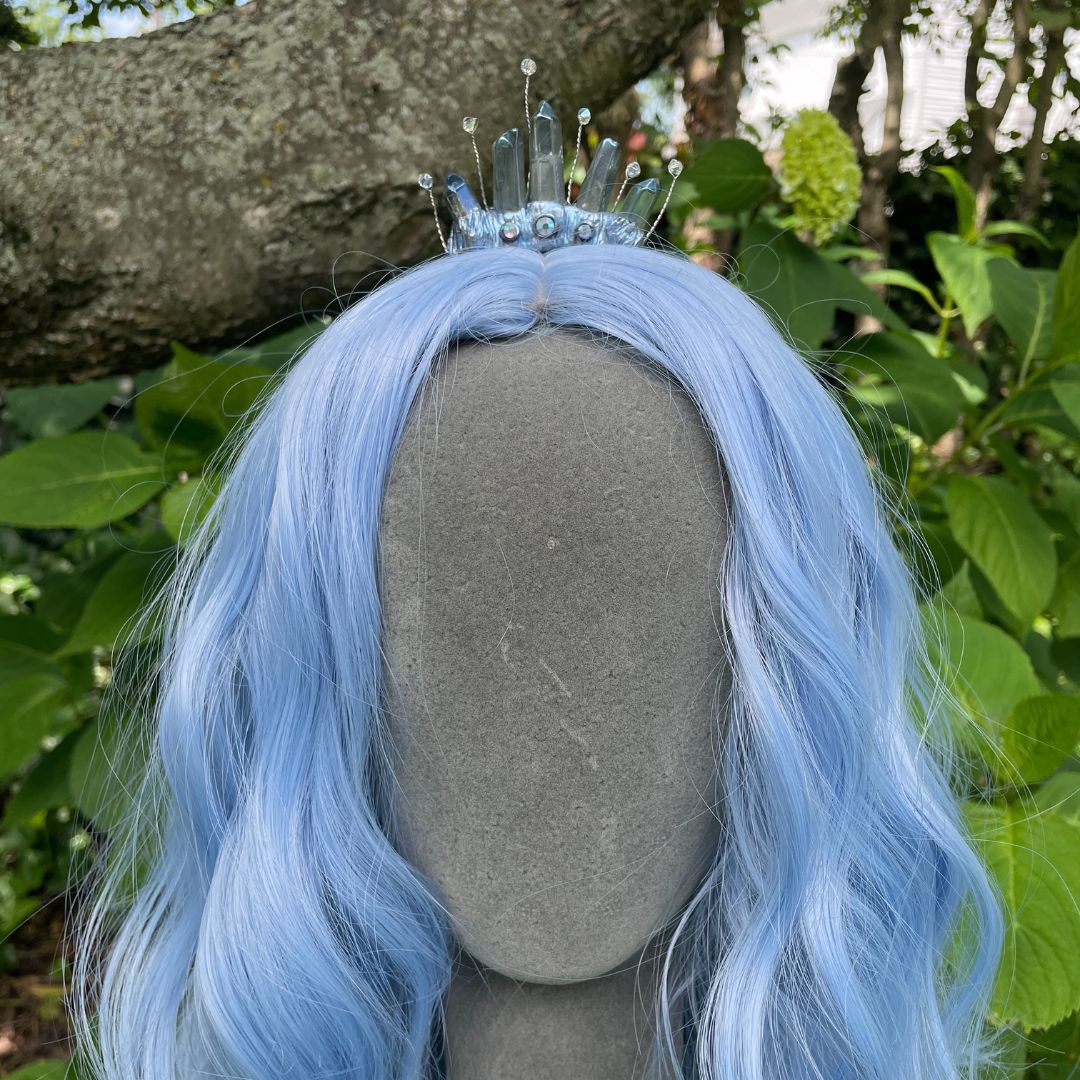 Fairy Princess blue tiara on a model with blue hair in a garden.