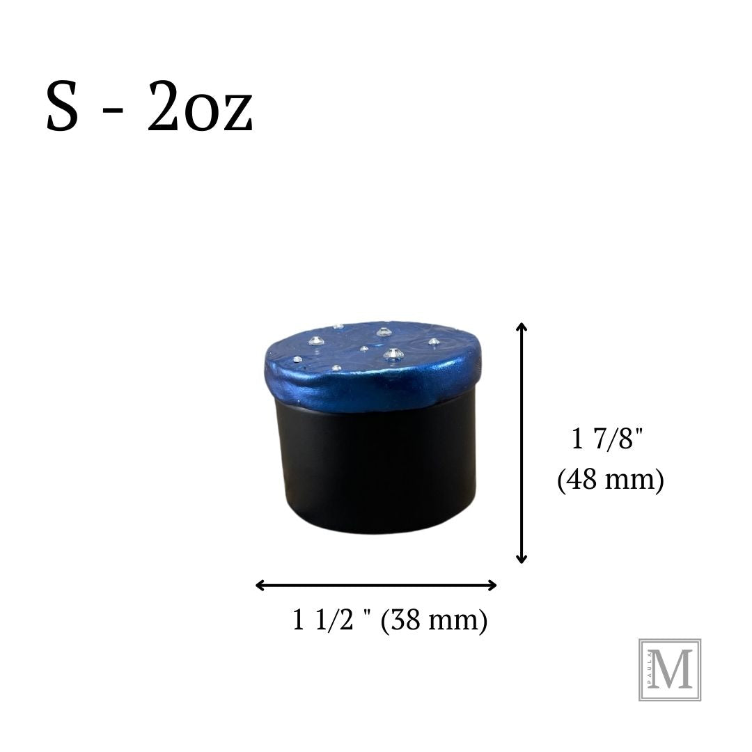 A black round tin with the Lid. Lid is decorated with polymer clay and hand painted metallic blue with blue and clear crystals. Measurements of tin are shown.