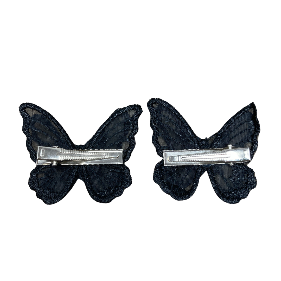 Back of large black applique butterfly alligator hair clips with your choice of crystals