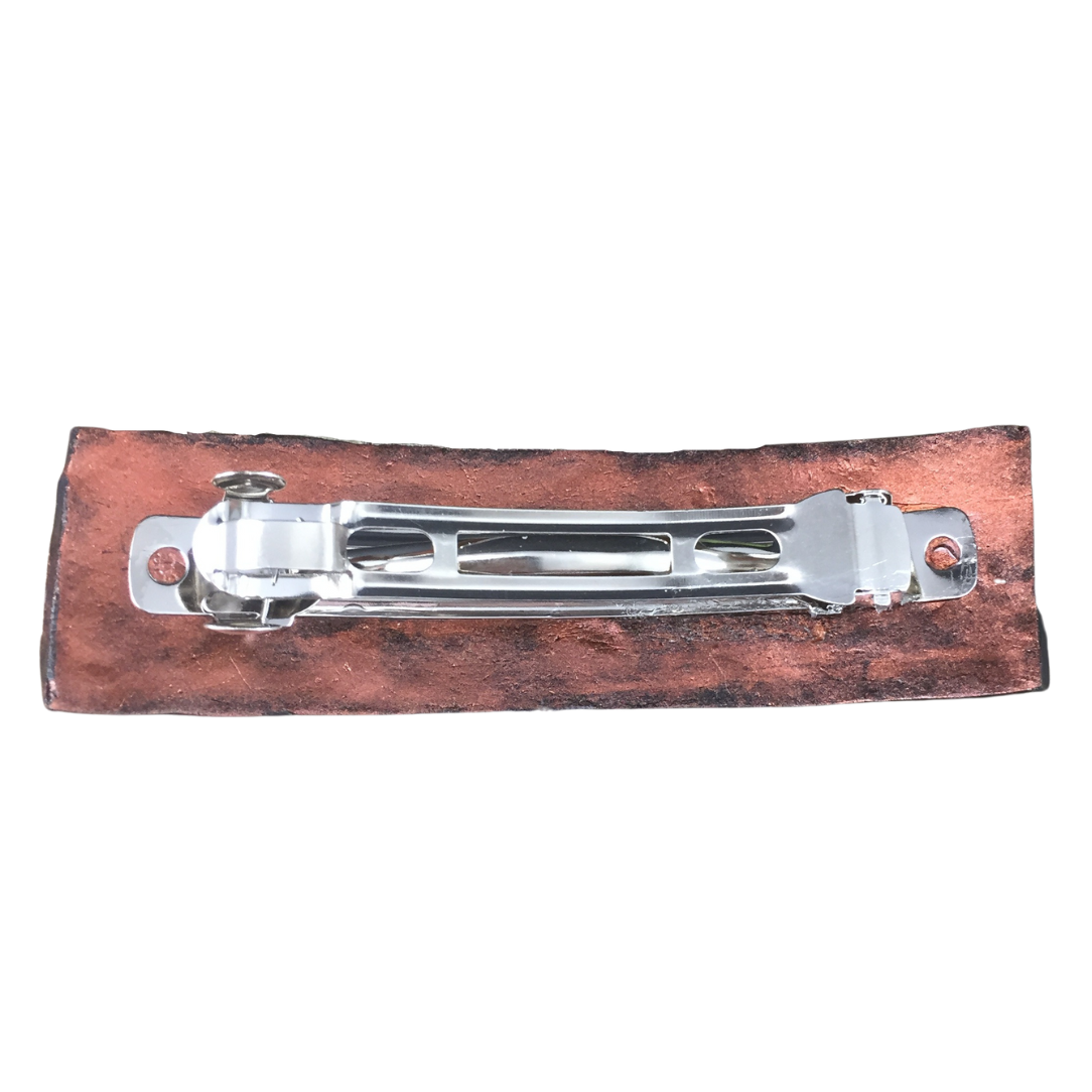 Back of Metallic copper colored, textured flower hair barrette showing 3 inch metal hair barrette clip.