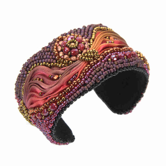 Magnificent Shibori beaded bangle in purple, red, bronze, and gold