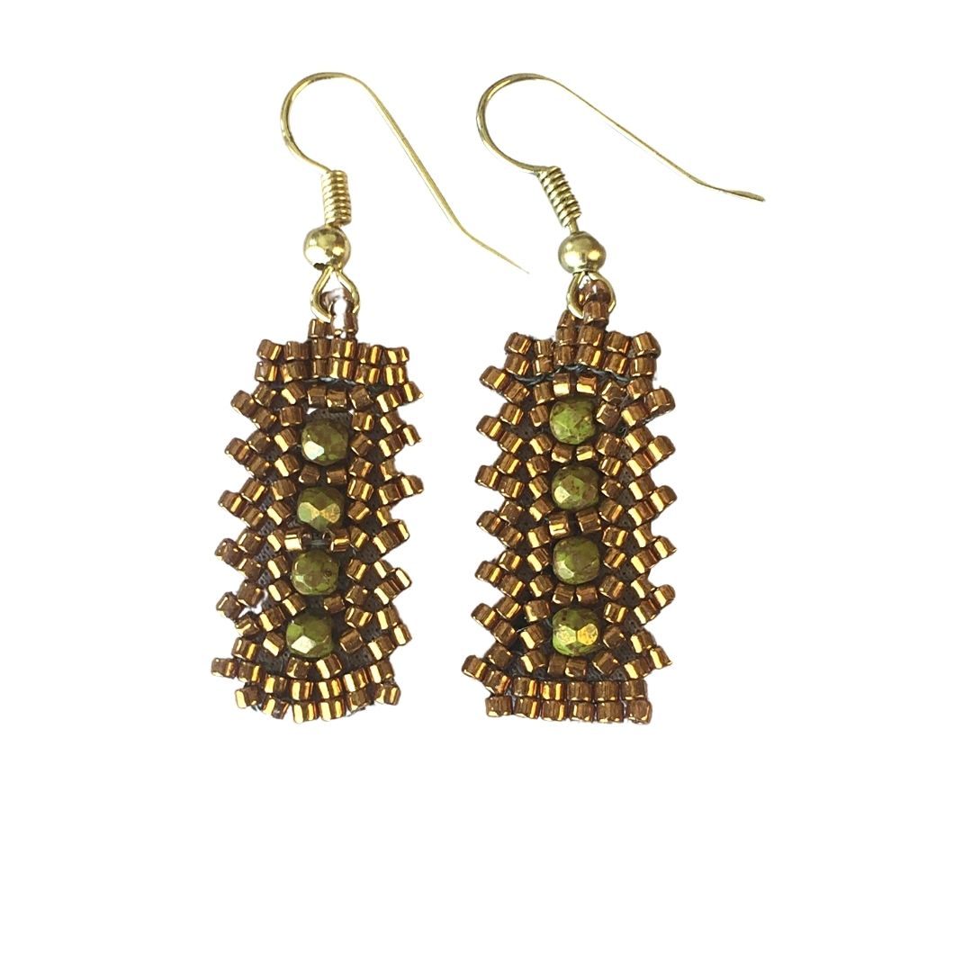 Olive crystals in a vertical row centered in gold beaded bar earrings
