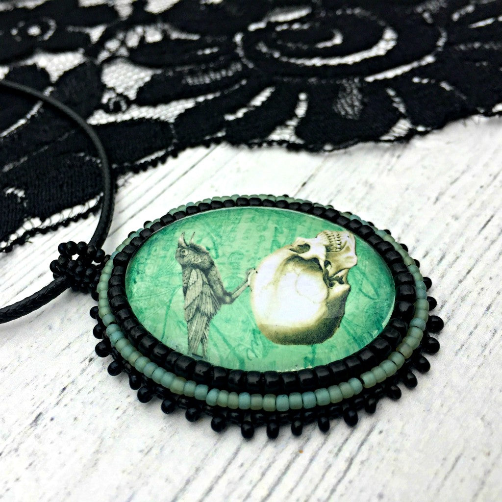 turquoise raven skull pendant
