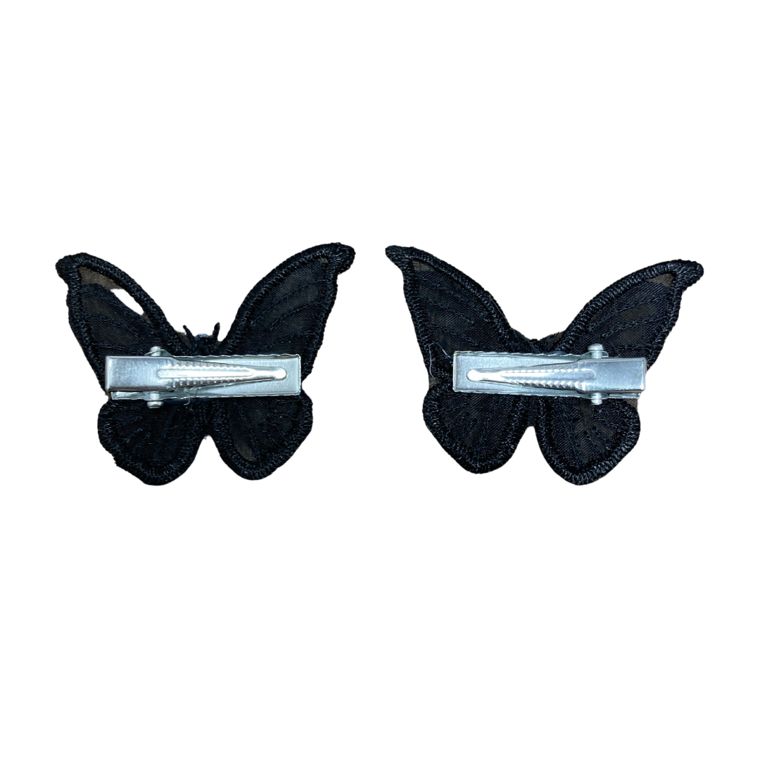 Back of small black applique butterfly alligator hair clips with your choice of crystals