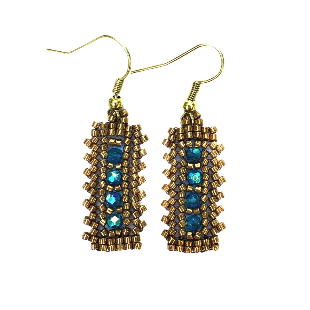 blue zircon crystals, in the center vertically, on gold beaded bar rectangle earrings