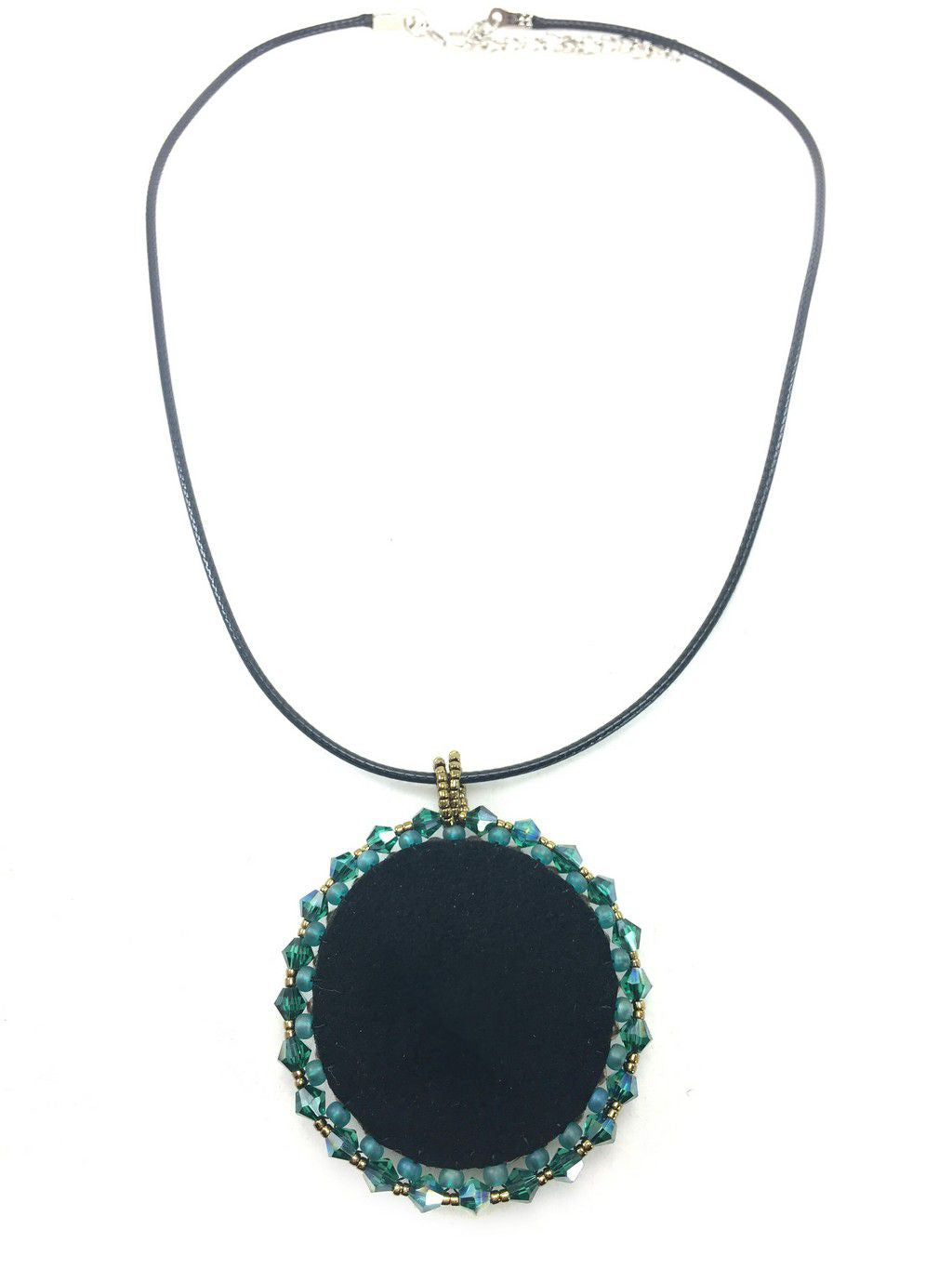 Back of round green and gold celtic love knot beaded pendant