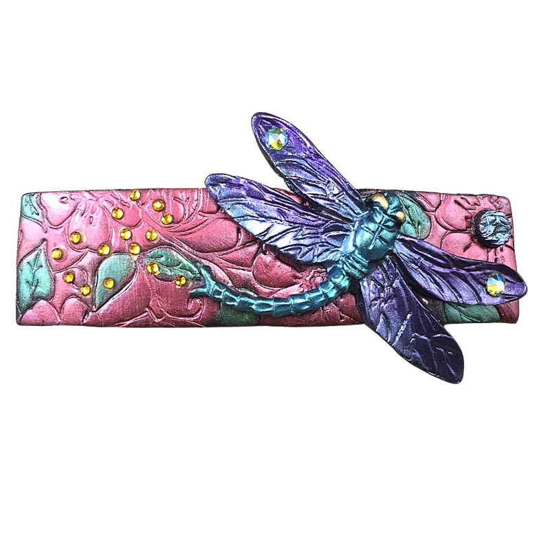 Dragonfly polymer clay hair barrette with pink base and purple and green dragonfly.