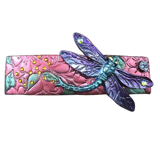 Dragonfly polymer clay hair barrette with pink base and purple and green dragonfly.