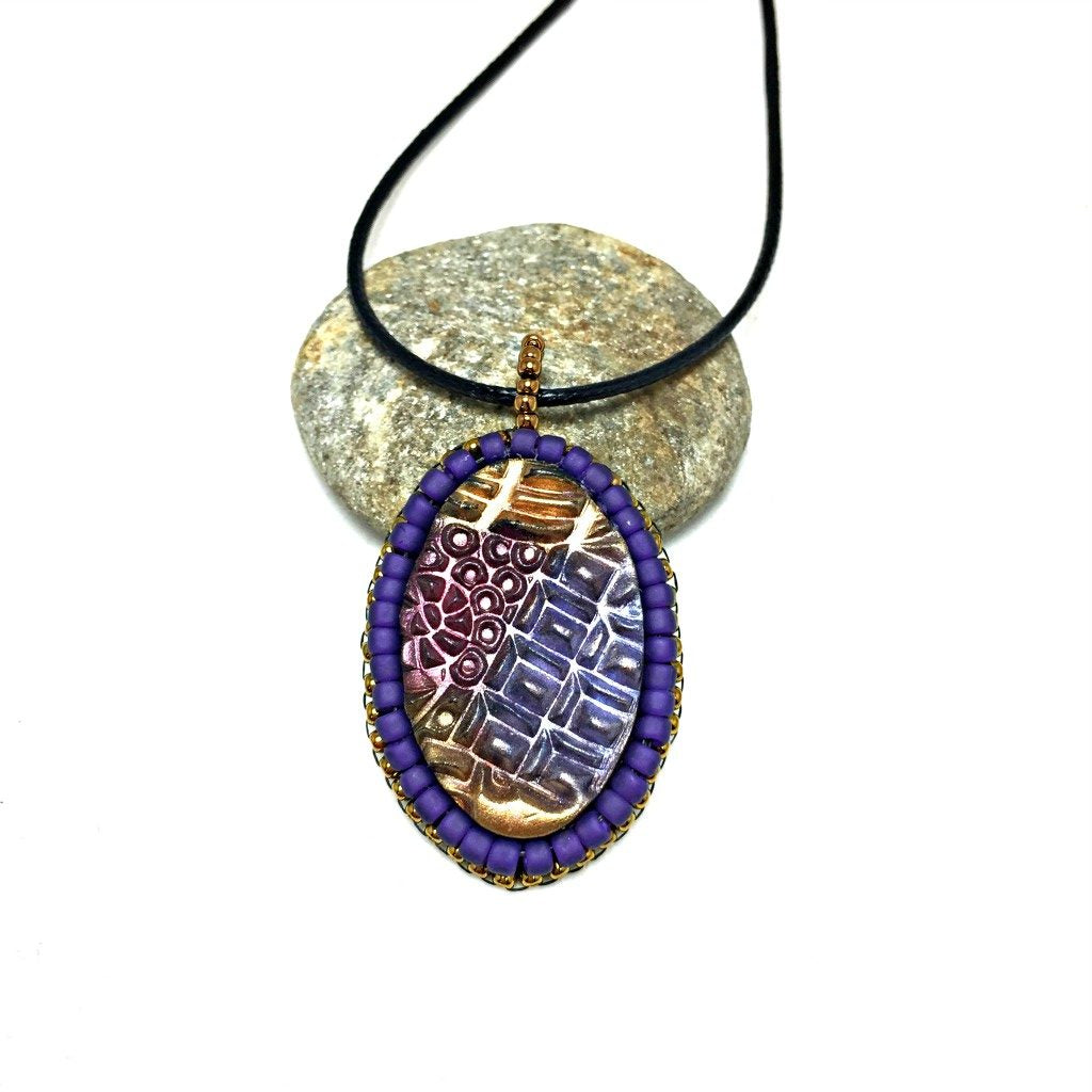 purple tangle art pendant distance shot