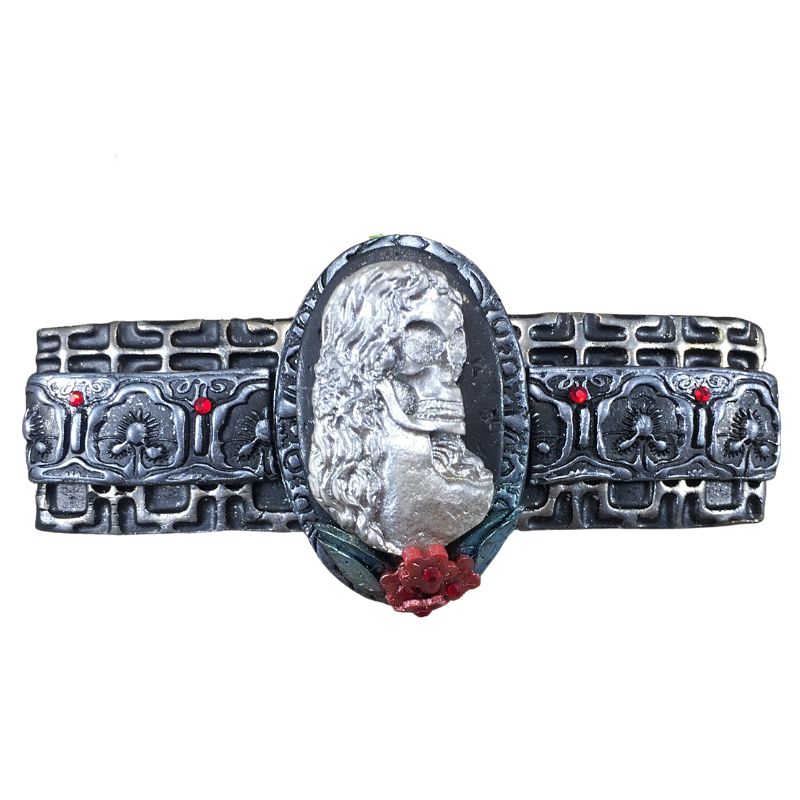 silver skeleton cameo polymer clay hair barrette with red flowers and red crystals with a black textured base highlighted silver.