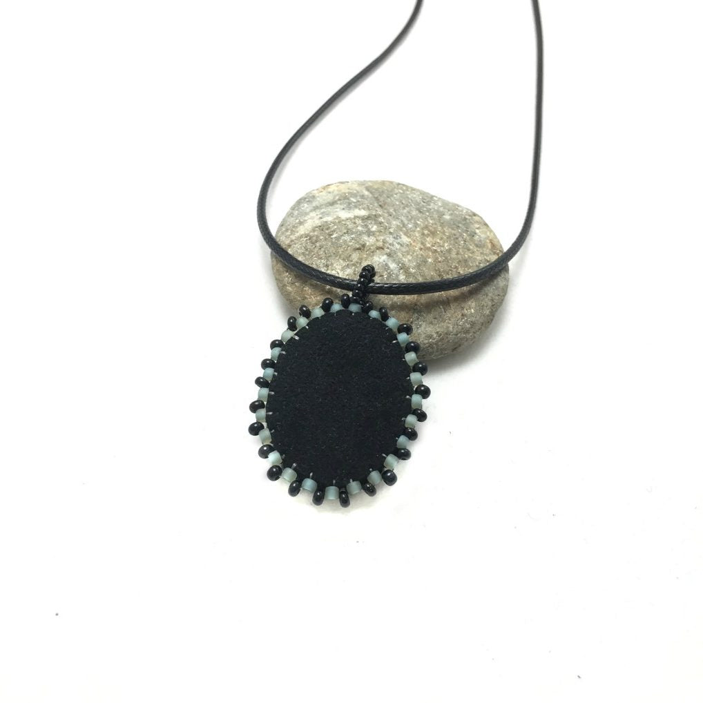 small turquoise Raven necklace
