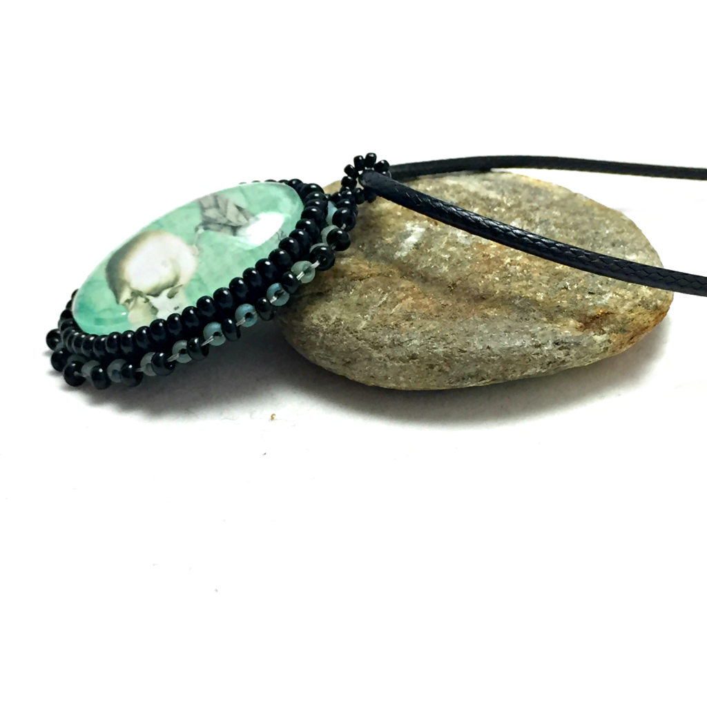 small turquoise raven necklace