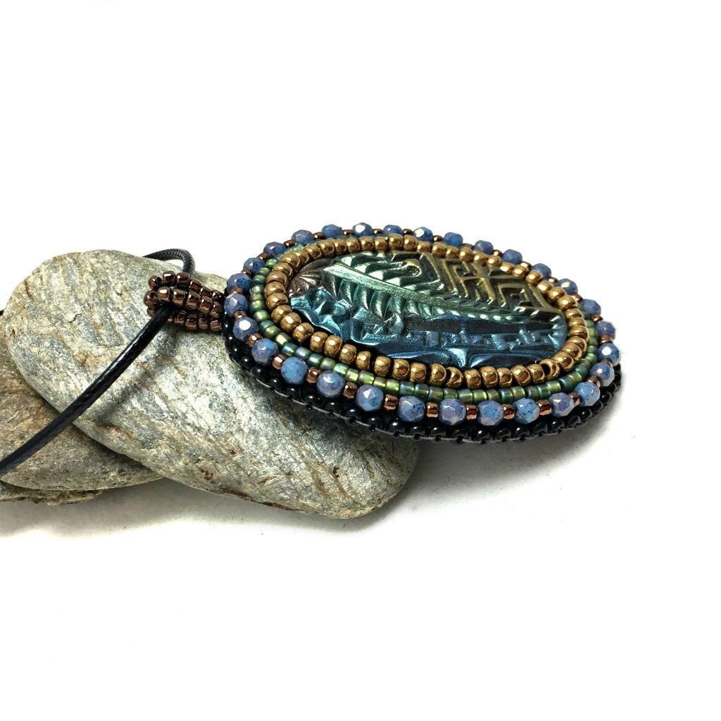 zentangle art pendant with blue crystals side shot