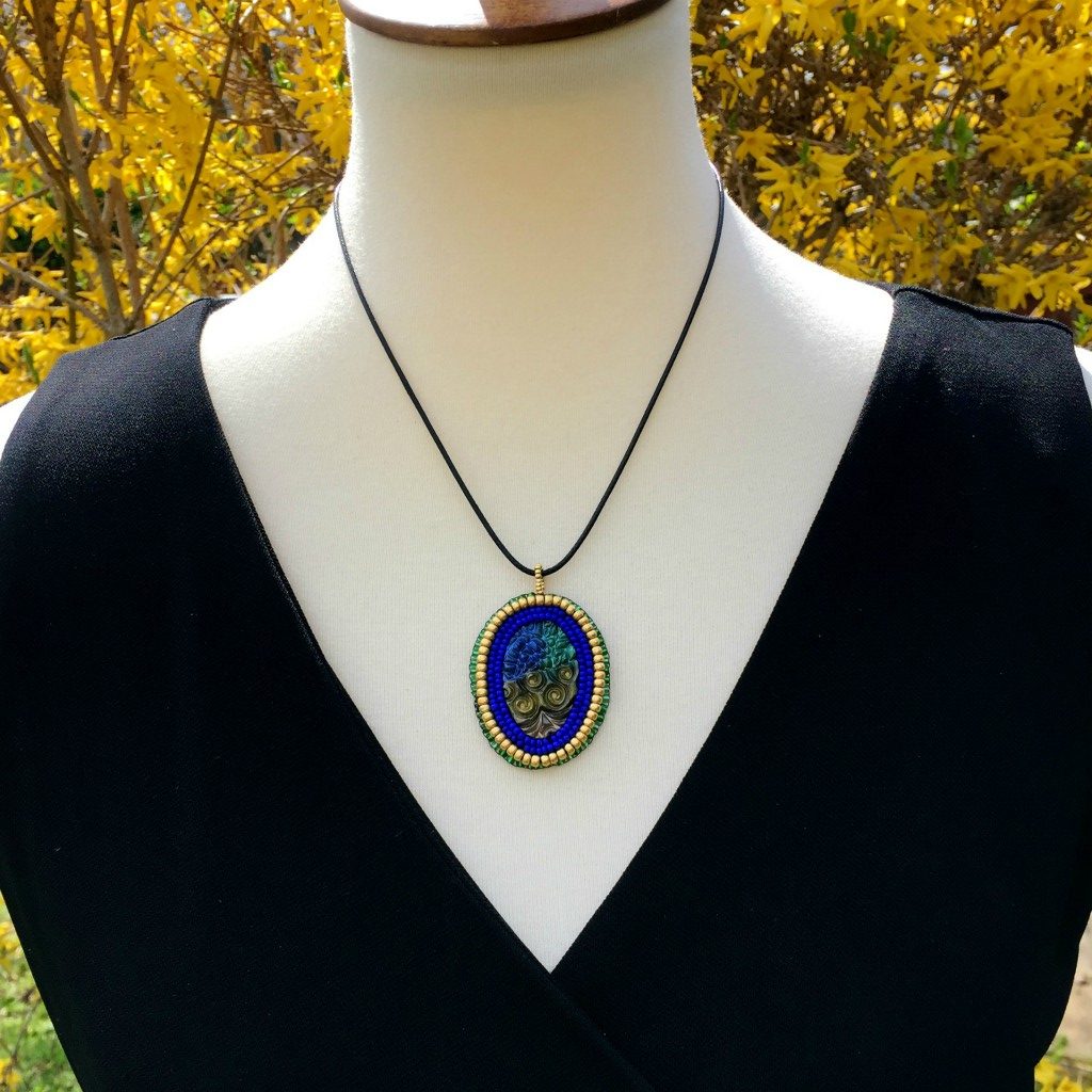 zentangle pattern pendant on mannequin