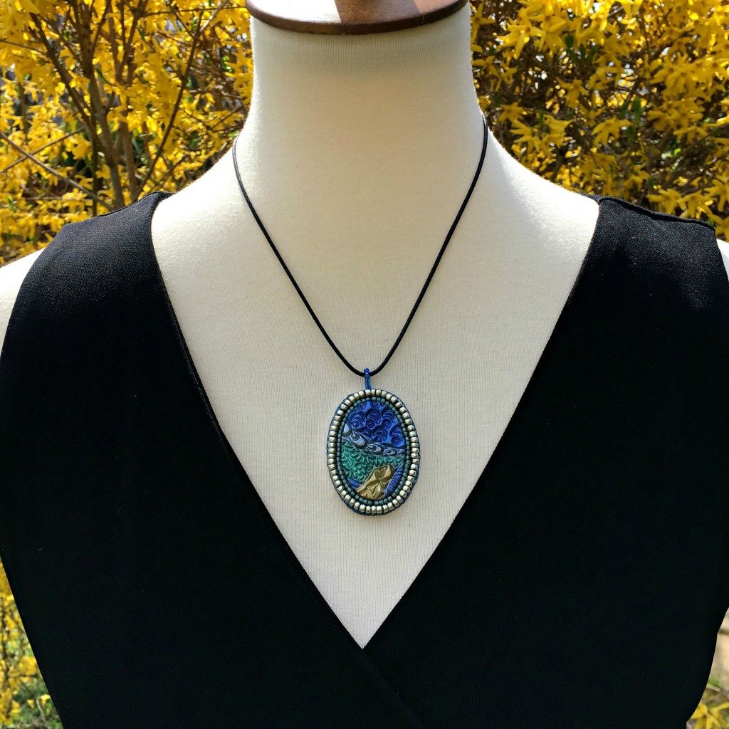 zentangle pendant on mannequin