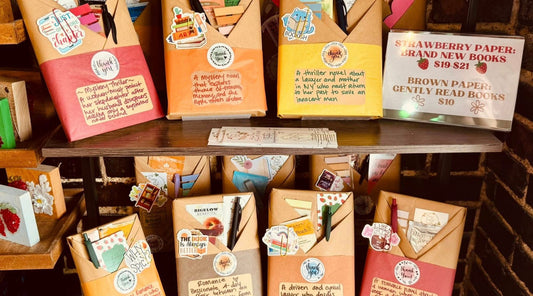 Bookshelf with wrapped mystery books