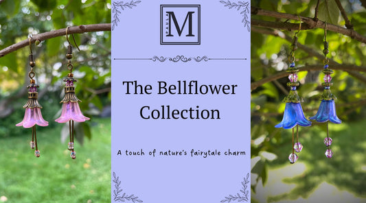 Pink and blue Bellfower earrings in a garden on either side of a middle section containing a logo and worded information announcing the new Bellflower earring collection.