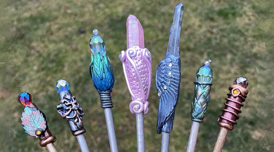 A collection of 7 handmade hair sticks with crystals