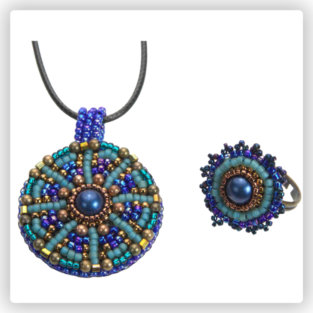 Colorful kaleidoscope pendant with blue, gold and turquoise seed beads with a blue pearl in the center.  A matching ring to the side.