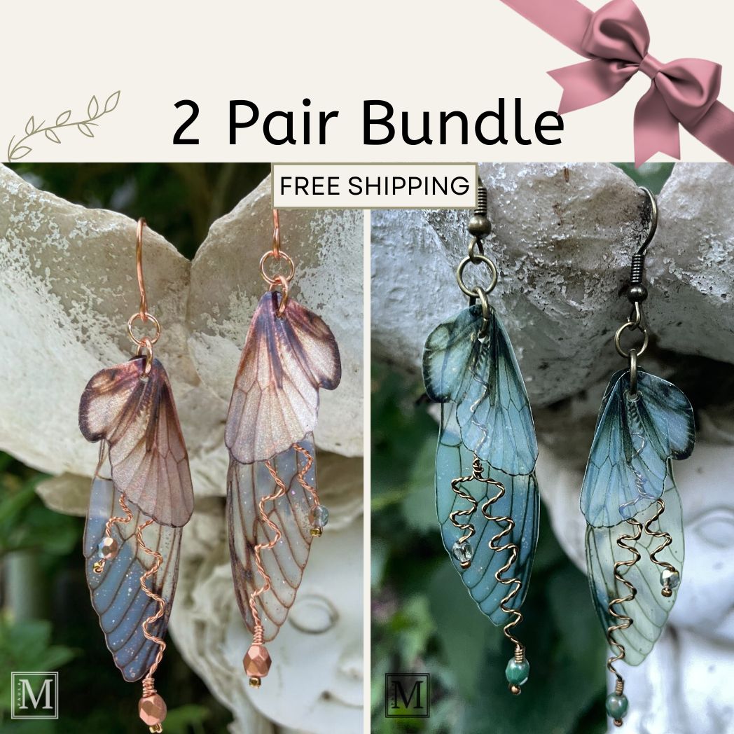 Two pairs of butterfly-winged earrings with free shipping text on a natural background.