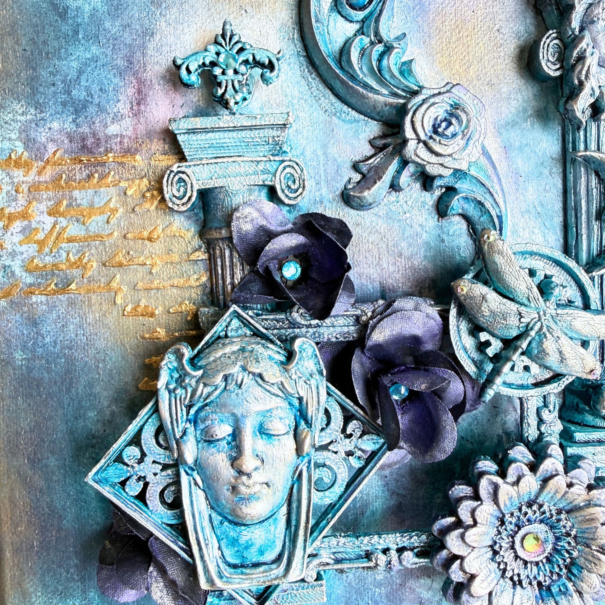 Decorative collage with ornate elements, flowers, and a face mask on a textured background.