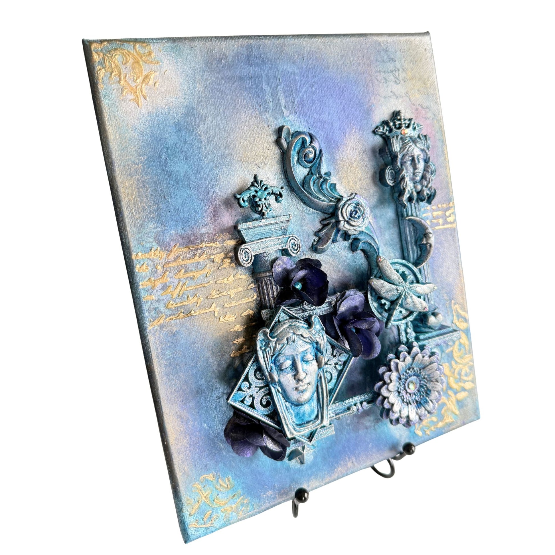 Decorative wall art piece with intricate designs and embellishments on a white background