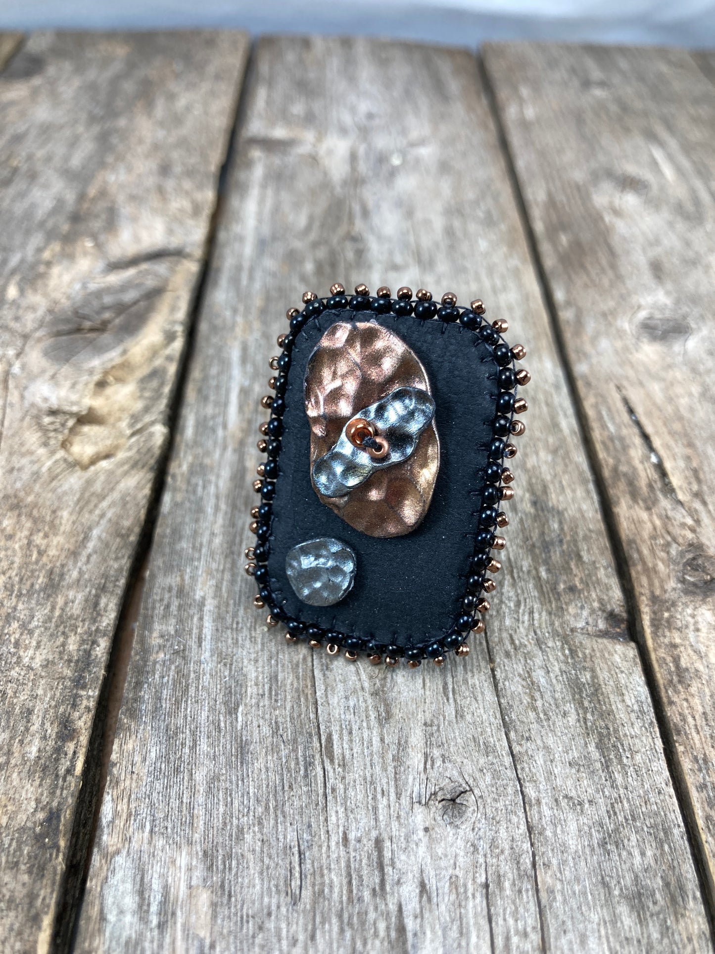 Rectangle statement ring with abstract hammered copper and silver clay with dark gold beaded edge