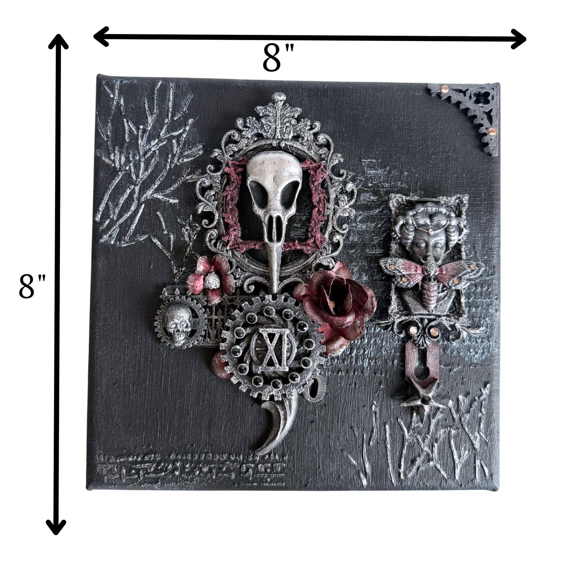 Decorative wall hook with skull and floral design on a black background, 8 inches by 8 inches.