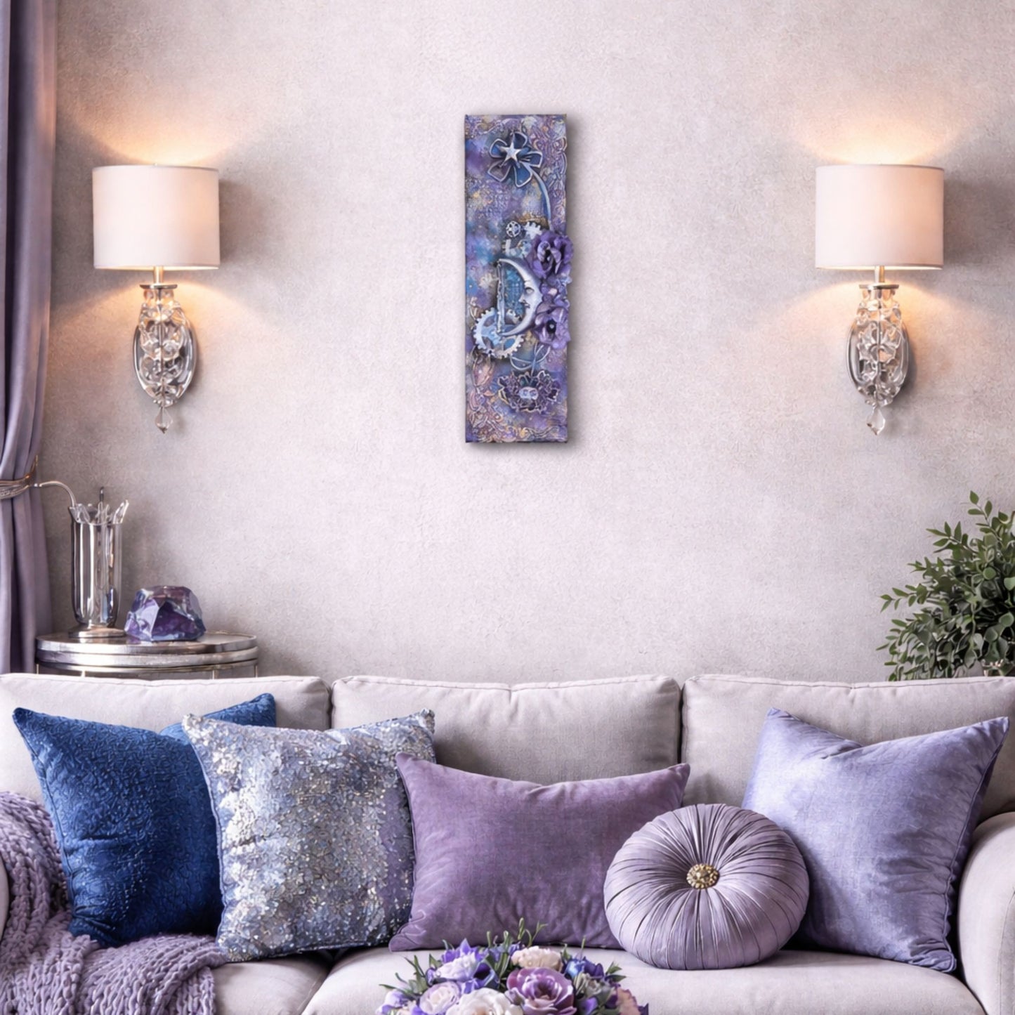 Living room with a gray sofa adorned with colorful pillows, wall sconces, and a decorative painting.