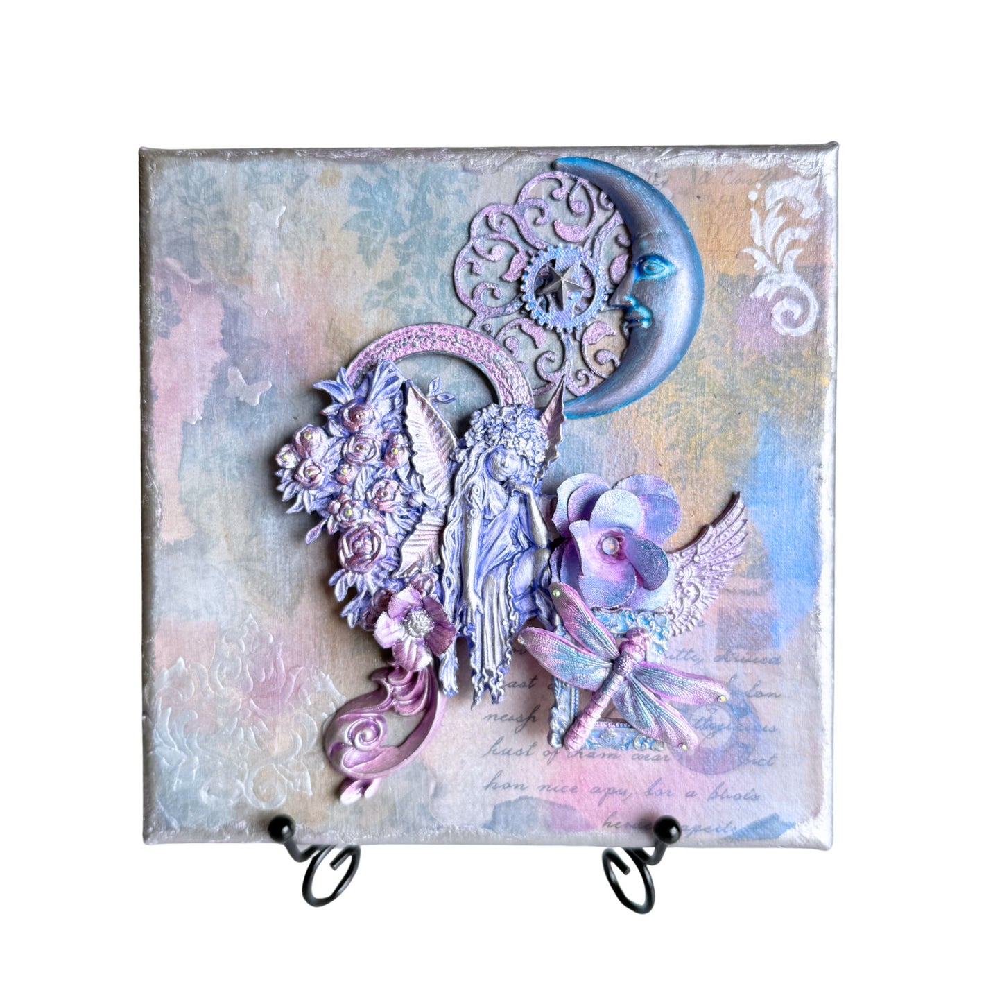 Decorative wall art with fairy and floral design on a textured background