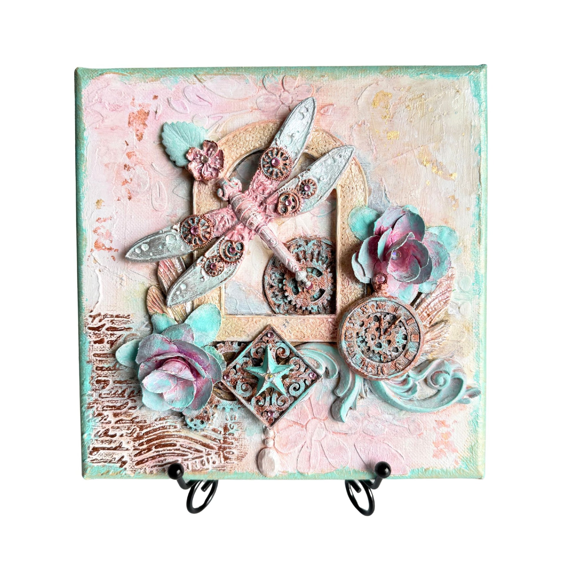 Decorative wall hook with floral and shell designs on a textured background