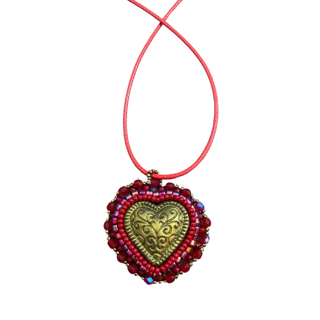 Gold puffed filigree heart  red beaded pendant