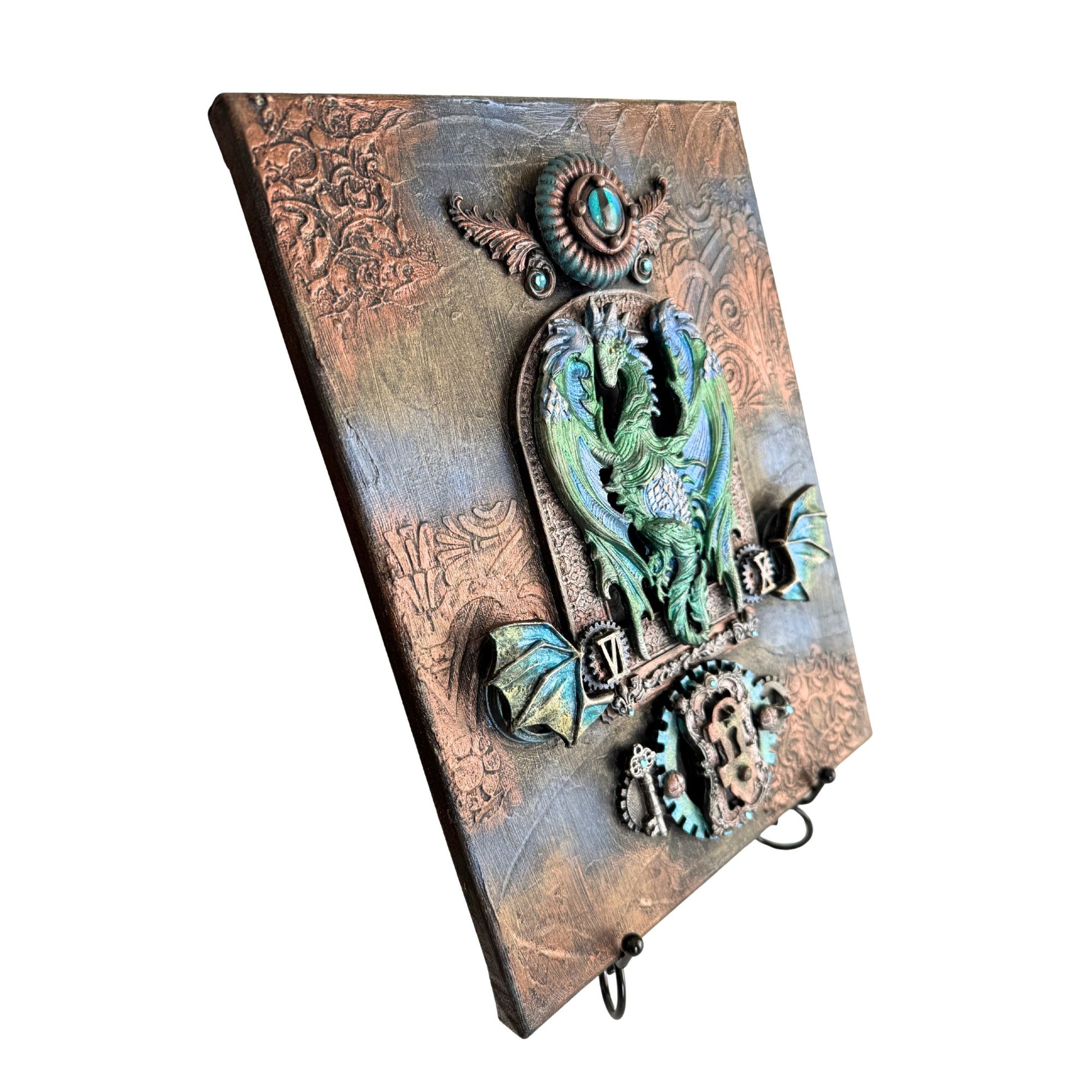 Decorative wall hook with owl design on a textured background