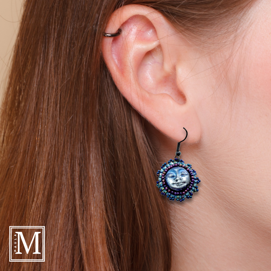 moon earrings on a model