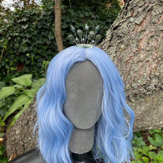 forest nymph headband tiara on model with a blue wig in a forest setting.