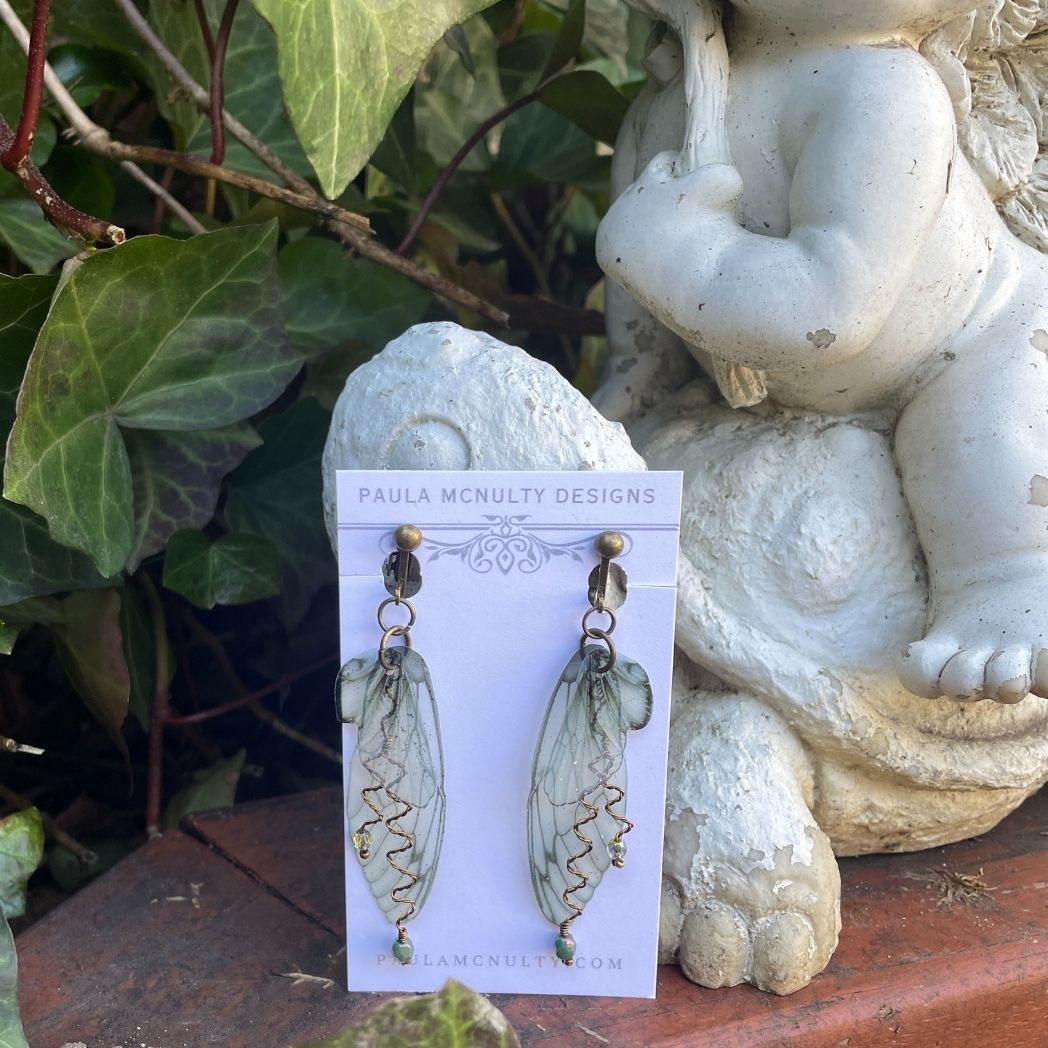 Green translucent butterfly wing earrings with wired crystals and clip on earrings