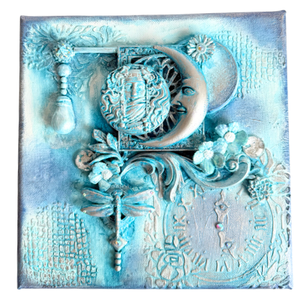 Decorative wall art with intricate designs in soft blue tones on a textured background