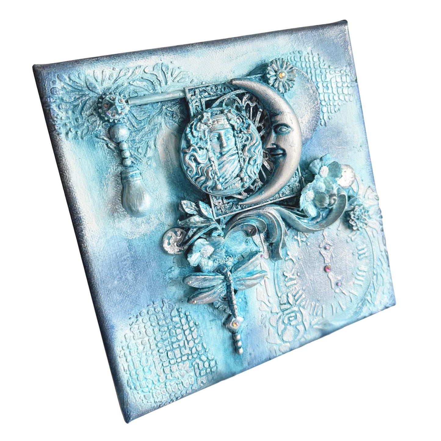 Decorative wall art with intricate designs on a textured blue background