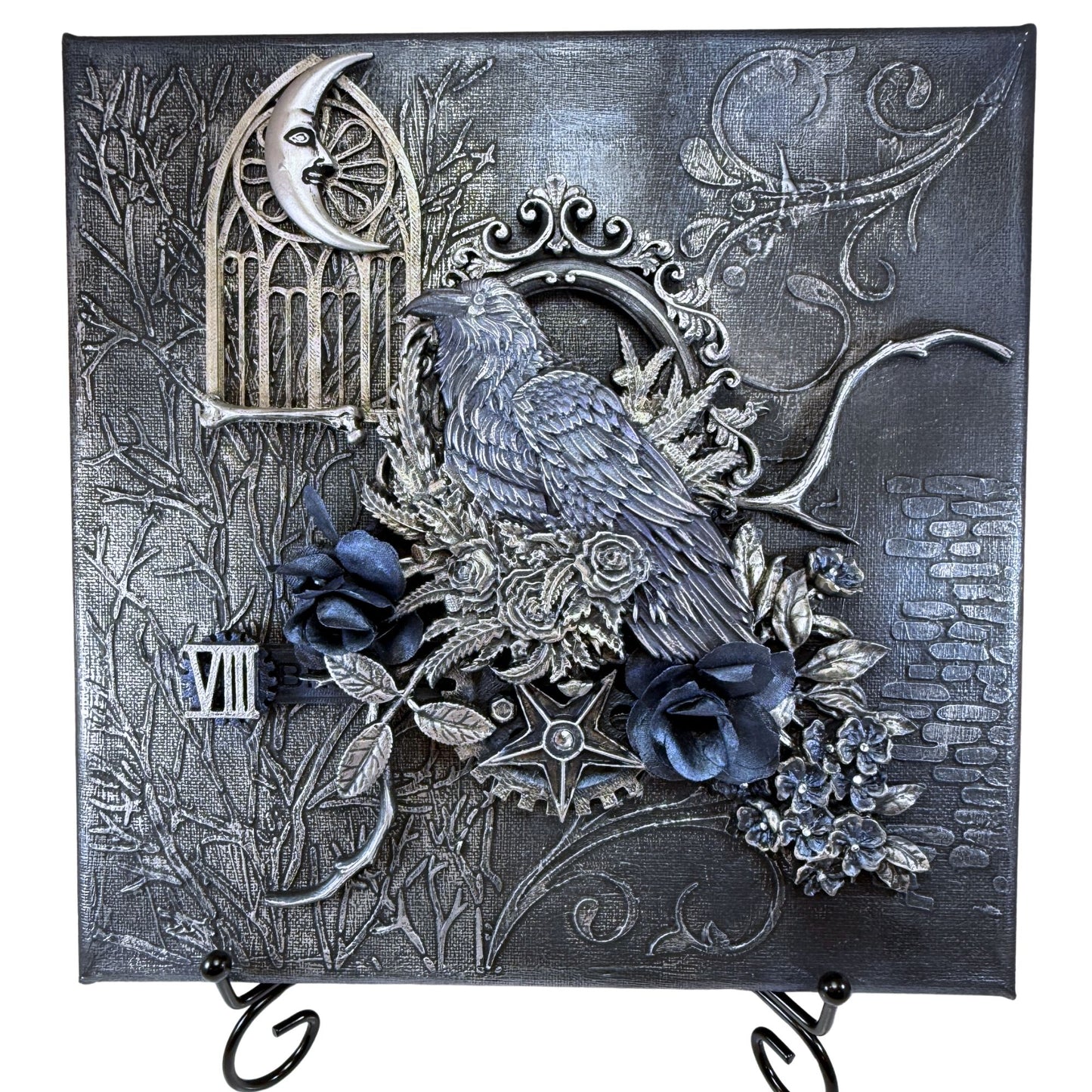 Decorative wall art with a crow, flowers, and gothic elements on a dark background.