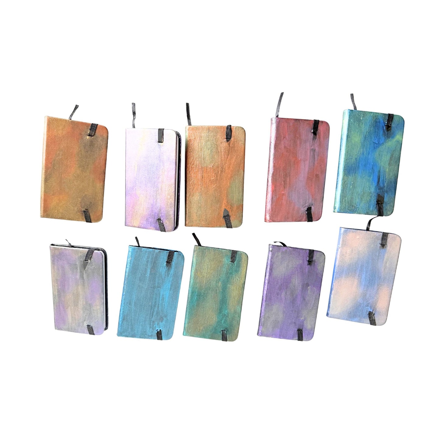 Set of colorful small notebooks with watercolor designs on a white background