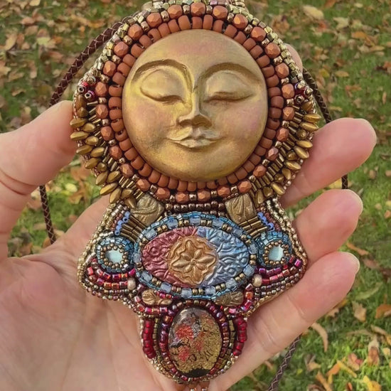 Statement beaded sun talisman necklace